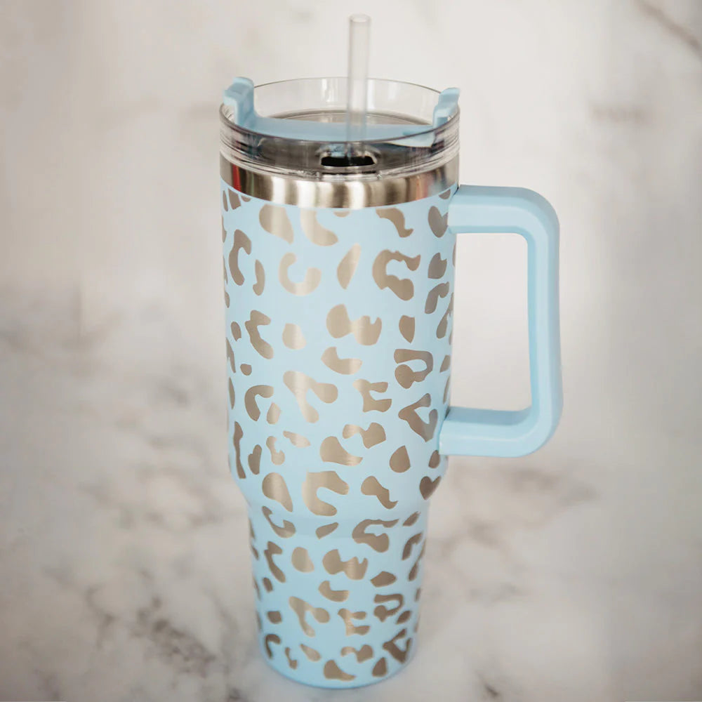 https://accentshomeandgifts.com/cdn/shop/products/coffee-tumbler-light-blue-metallic-leopard.webp?v=1689030827