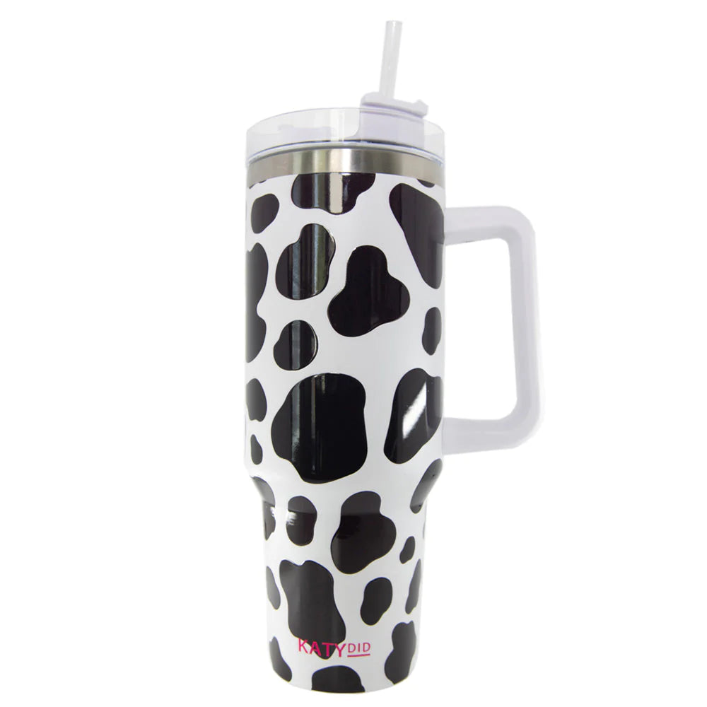 https://accentshomeandgifts.com/cdn/shop/products/cow-print-tumbler-cup-coffee_1445x.webp?v=1689030614